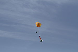 model-rocket-deploying-parachute